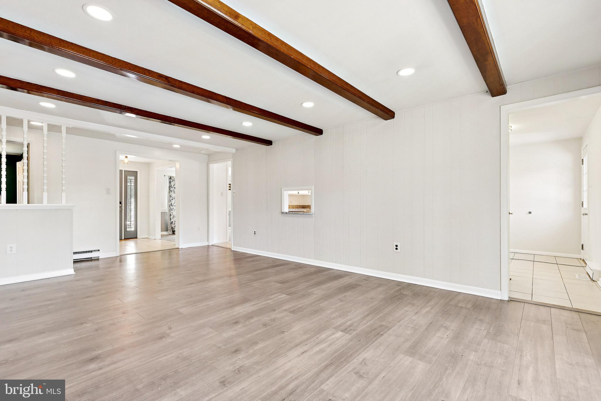 6127 Beverleys Mill Road Broad Run, VA 20137 - Photo 13 of 28 Spacious living area with elegant beams.