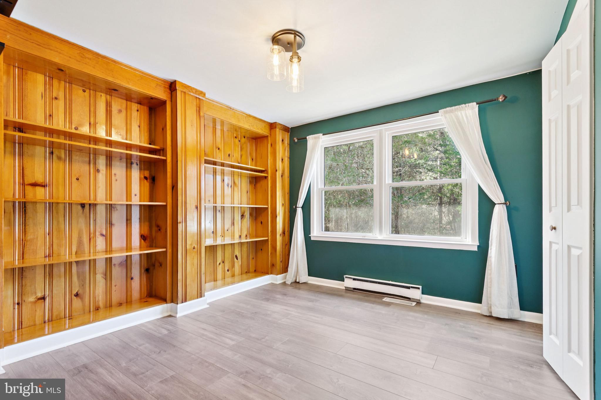 6127 Beverleys Mill Road Broad Run, VA 20137 - Photo 18 of 28 Second bedroom/office with charming wood built-ins