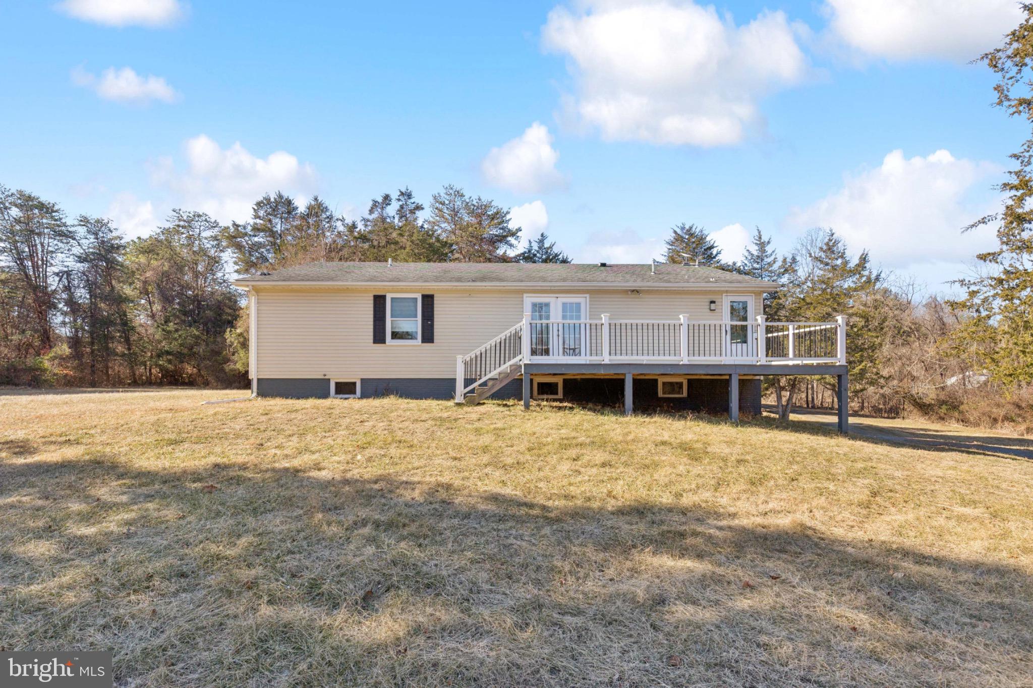6127 Beverleys Mill Road Broad Run, VA 20137 - Photo 2 of 28 Large back deck with scenic outdoor views.