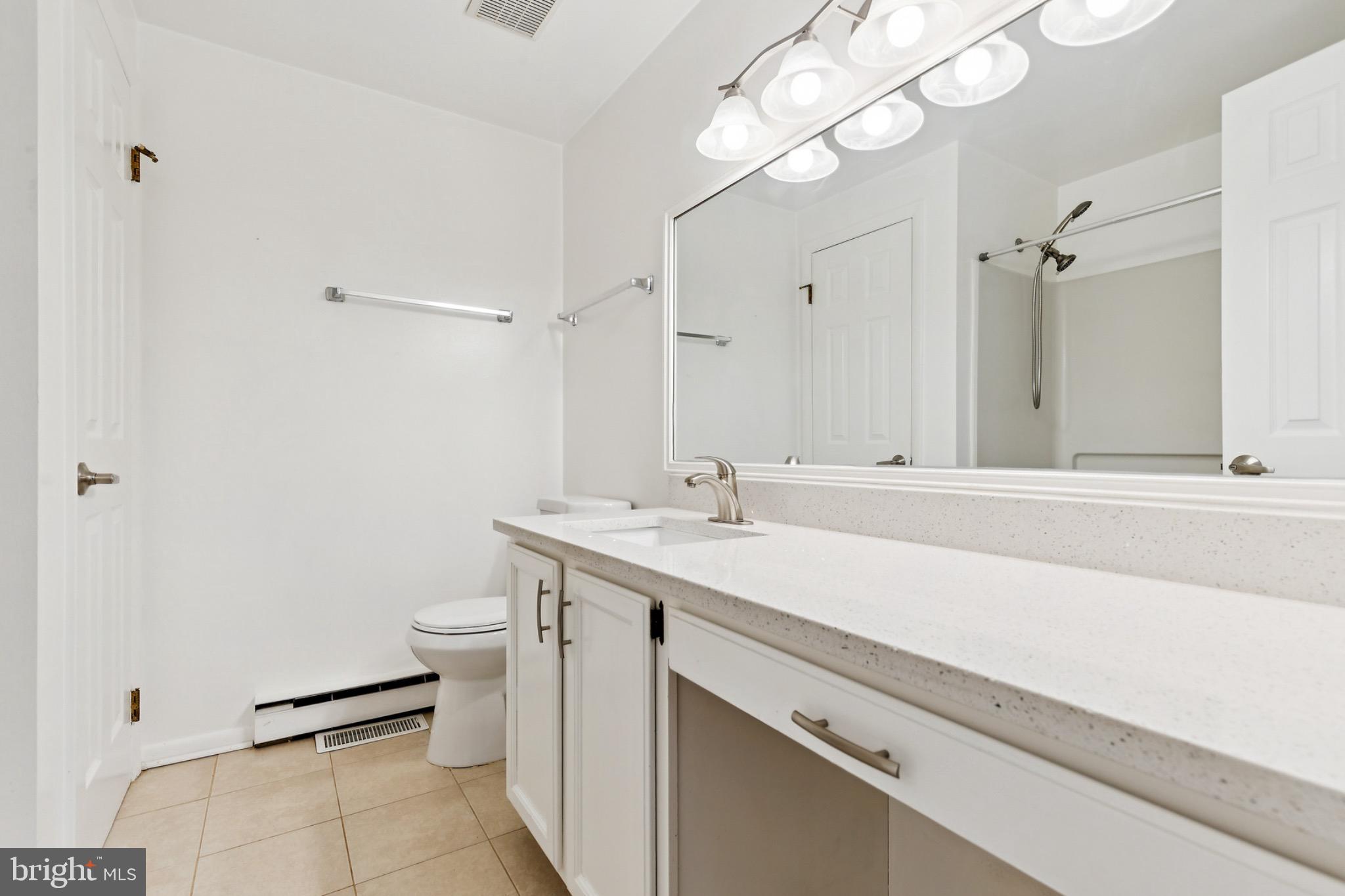 6127 Beverleys Mill Road Broad Run, VA 20137 - Photo 21 of 28 Modern bathroom with sleek finishes.