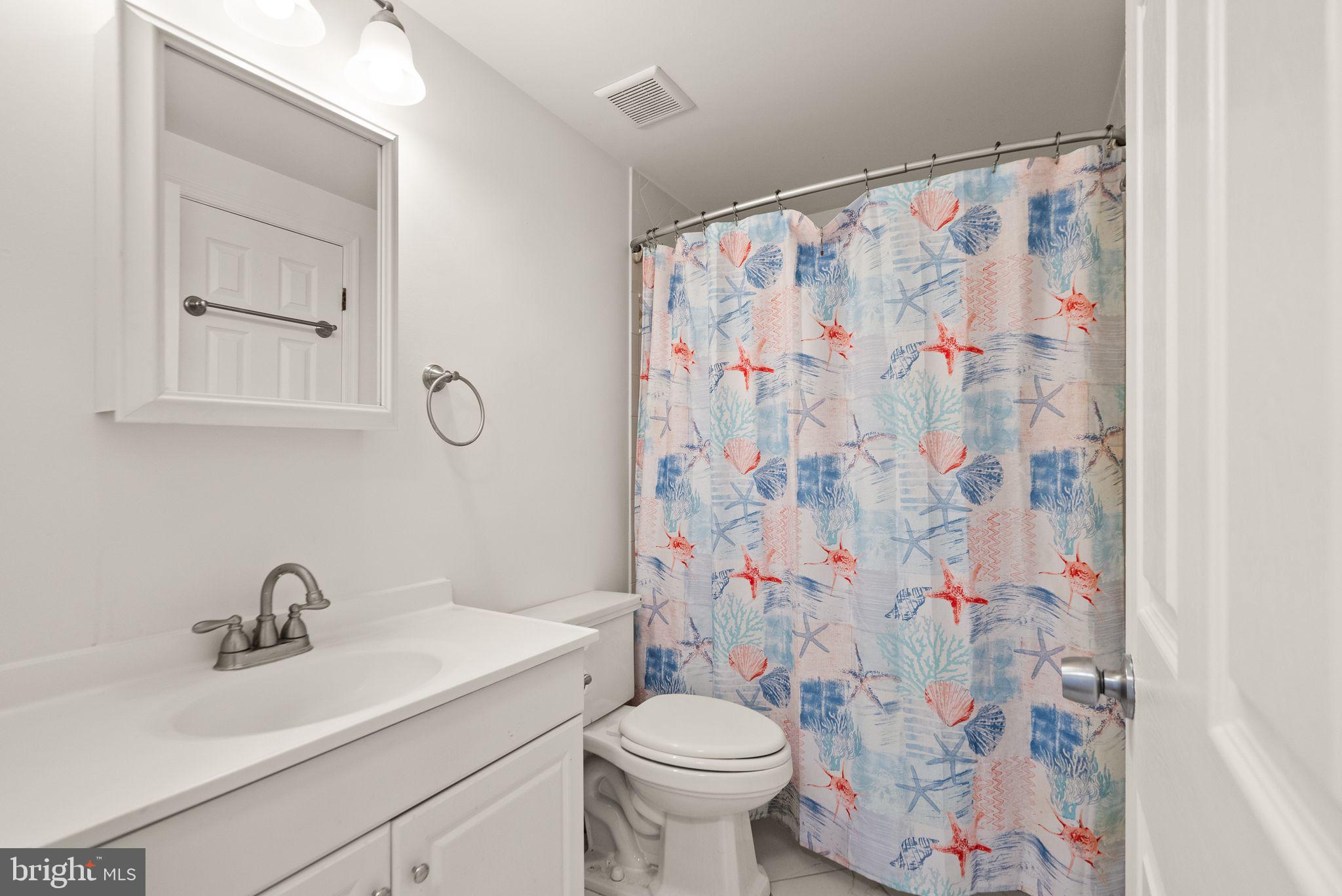 2280 Cocquina Drive Reston, VA 20191 - Photo 34 of 66 a bathroom with a sink toilet and shower