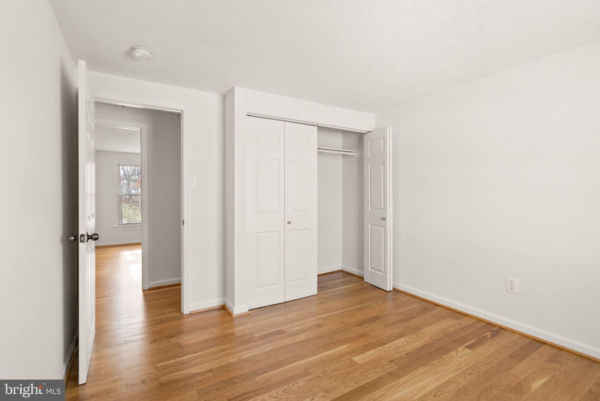 2280 Cocquina Drive Reston, VA 20191 - Photo 38 of 66 a view of empty room with wooden floor