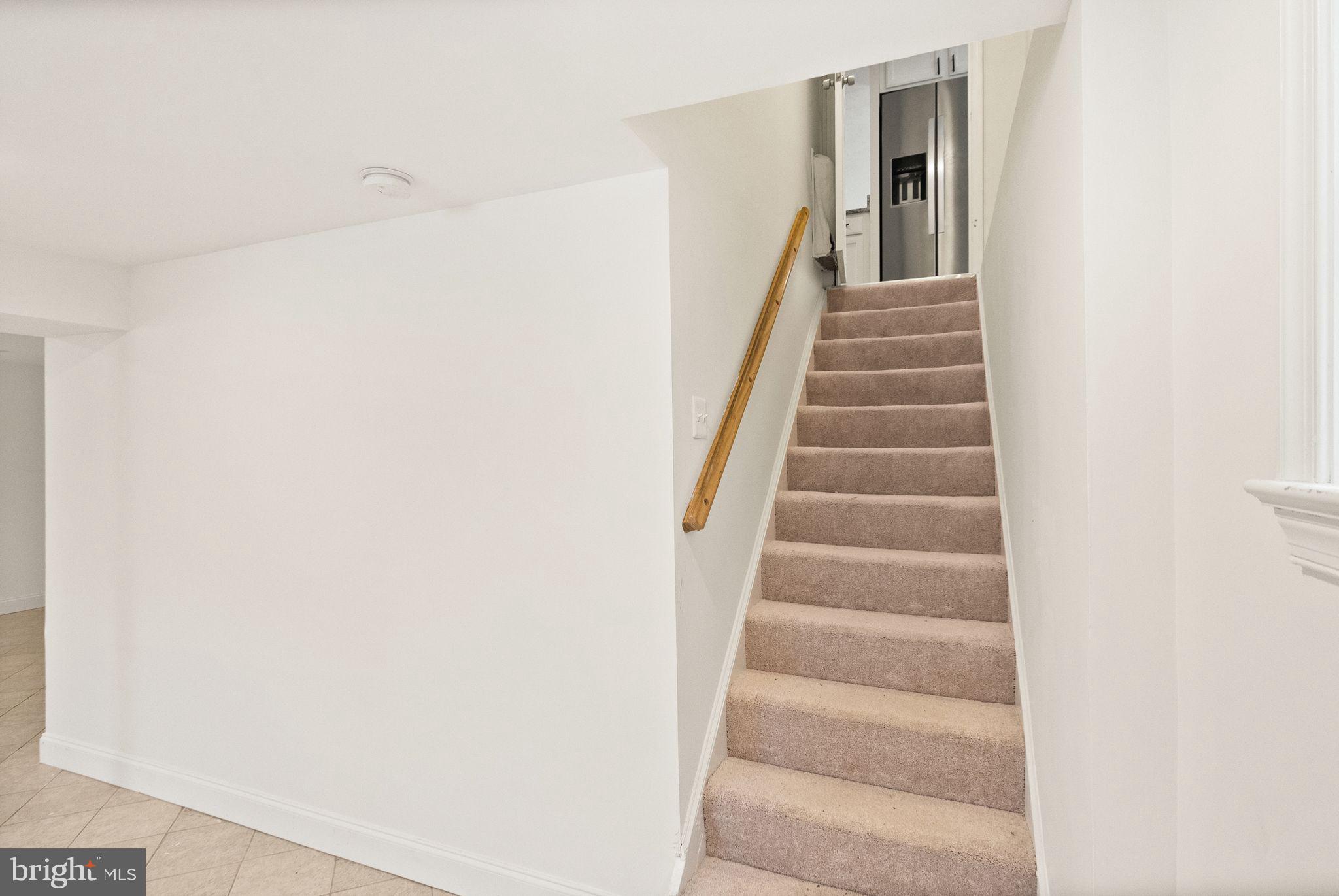 2280 Cocquina Drive Reston, VA 20191 - Photo 42 of 66 a view of staircase with white walls