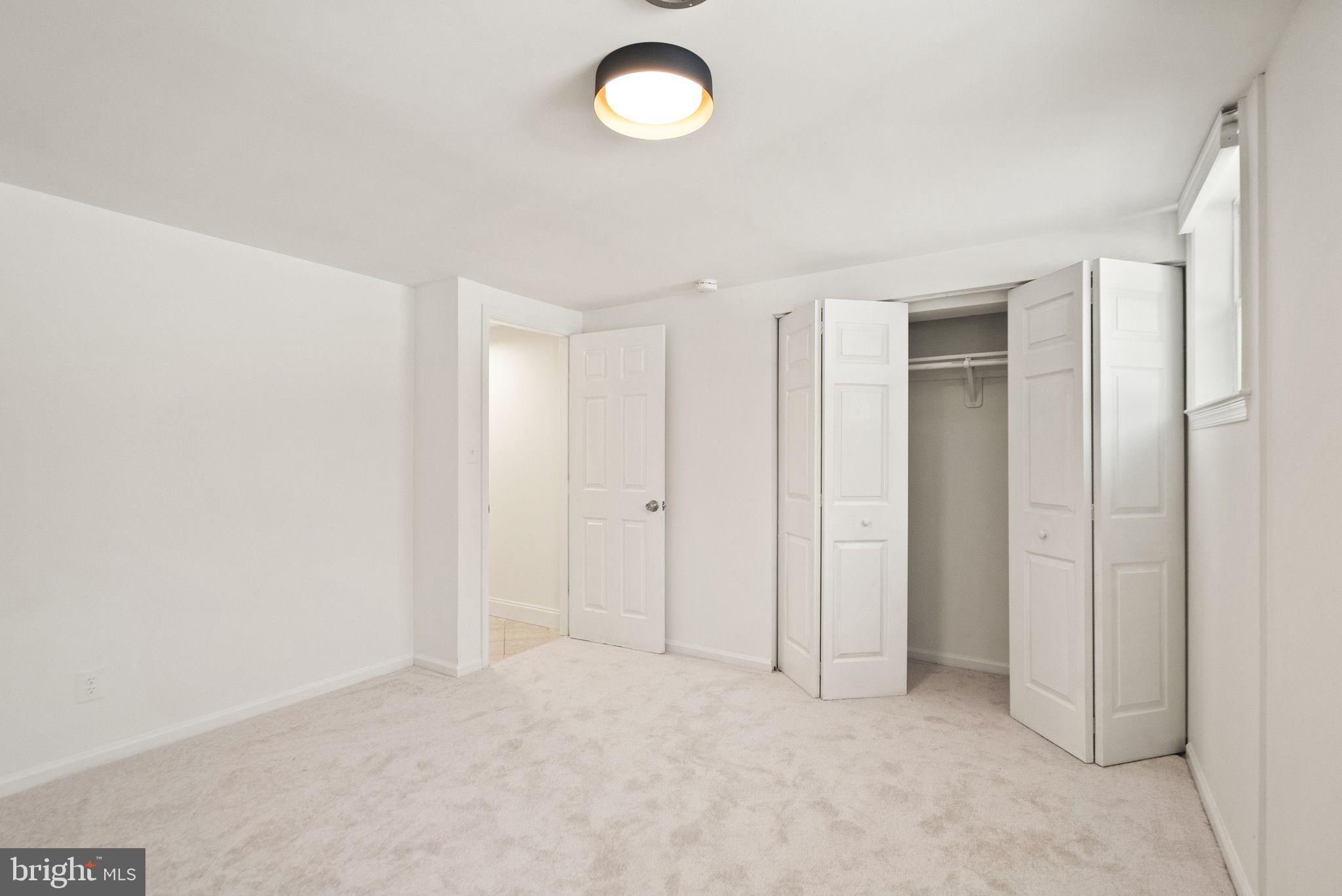 2280 Cocquina Drive Reston, VA 20191 - Photo 53 of 66 an empty room with fan and window
