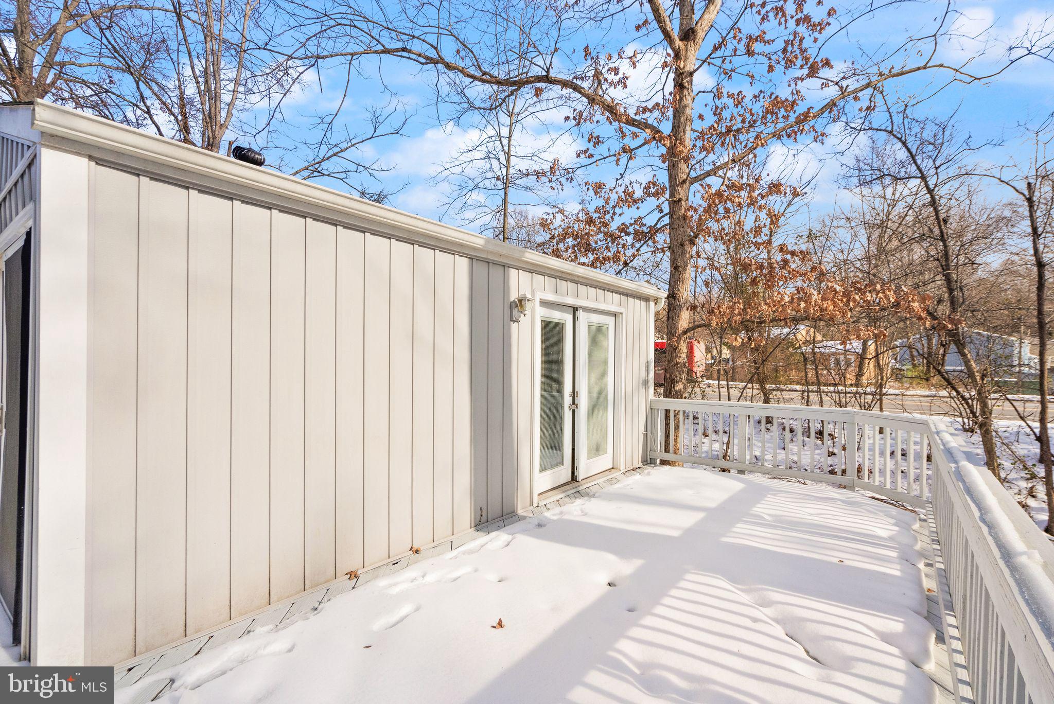 2280 Cocquina Drive Reston, VA 20191 - Photo 58 of 66 a view of a house with a snow on the road