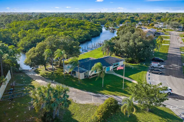 a view of a garden with swimming pool