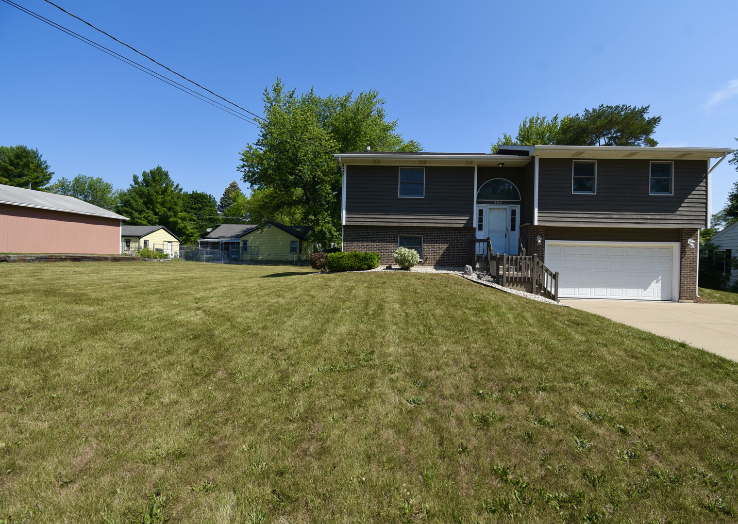 406 Garfield Road Fox Lake, IL 60041 - Photo 2 of 33 a view of a house with backyard and sitting area