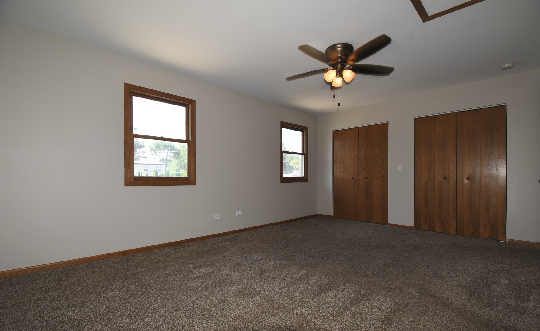 406 Garfield Road Fox Lake, IL 60041 - Photo 11 of 33 a view of a livingroom with a ceiling fan and window