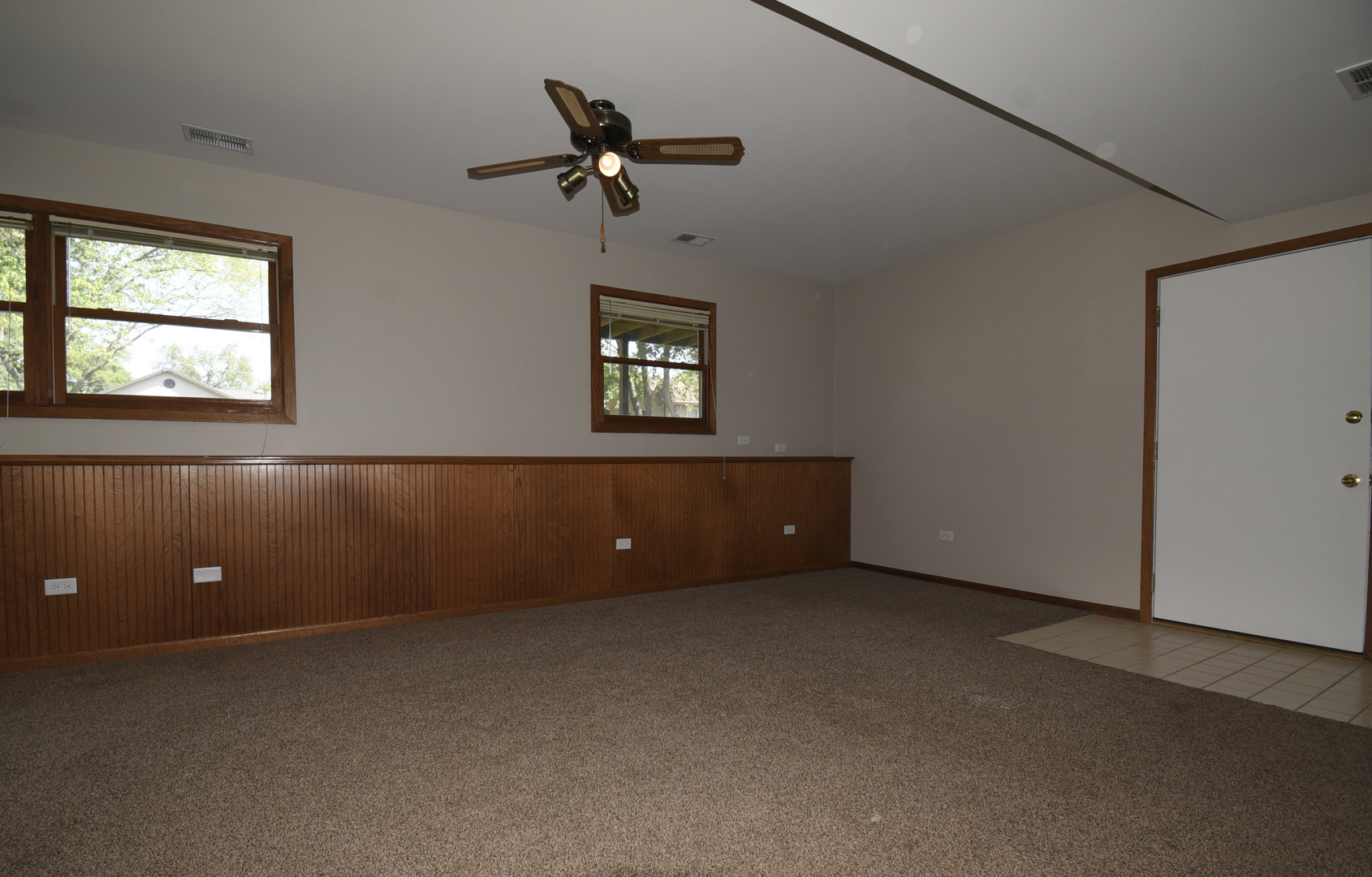 406 Garfield Road Fox Lake, IL 60041 - Photo 22 of 33 a view of an empty room with a window