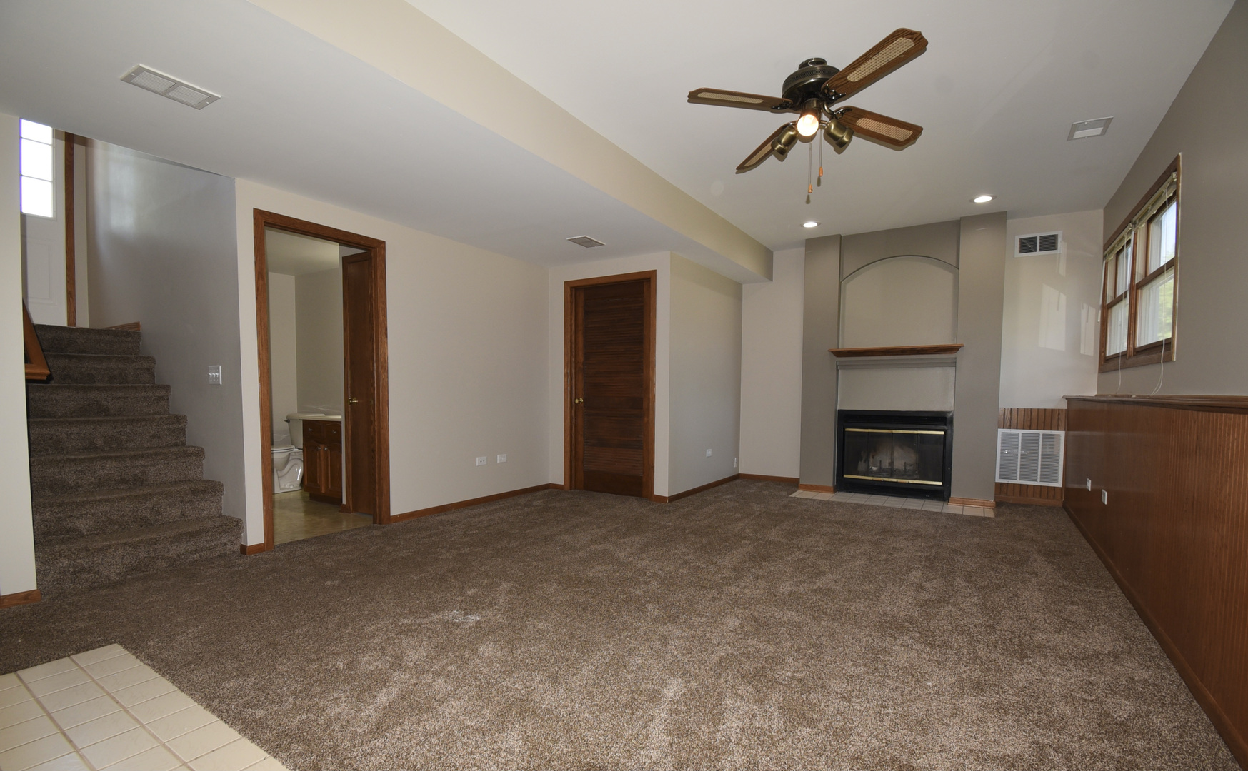 406 Garfield Road Fox Lake, IL 60041 - Photo 23 of 33 a view of an empty room with a fireplace