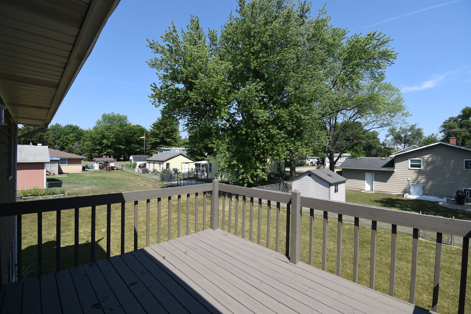 406 Garfield Road Fox Lake, IL 60041 - Photo 31 of 33 a view of wooden deck and a backyard