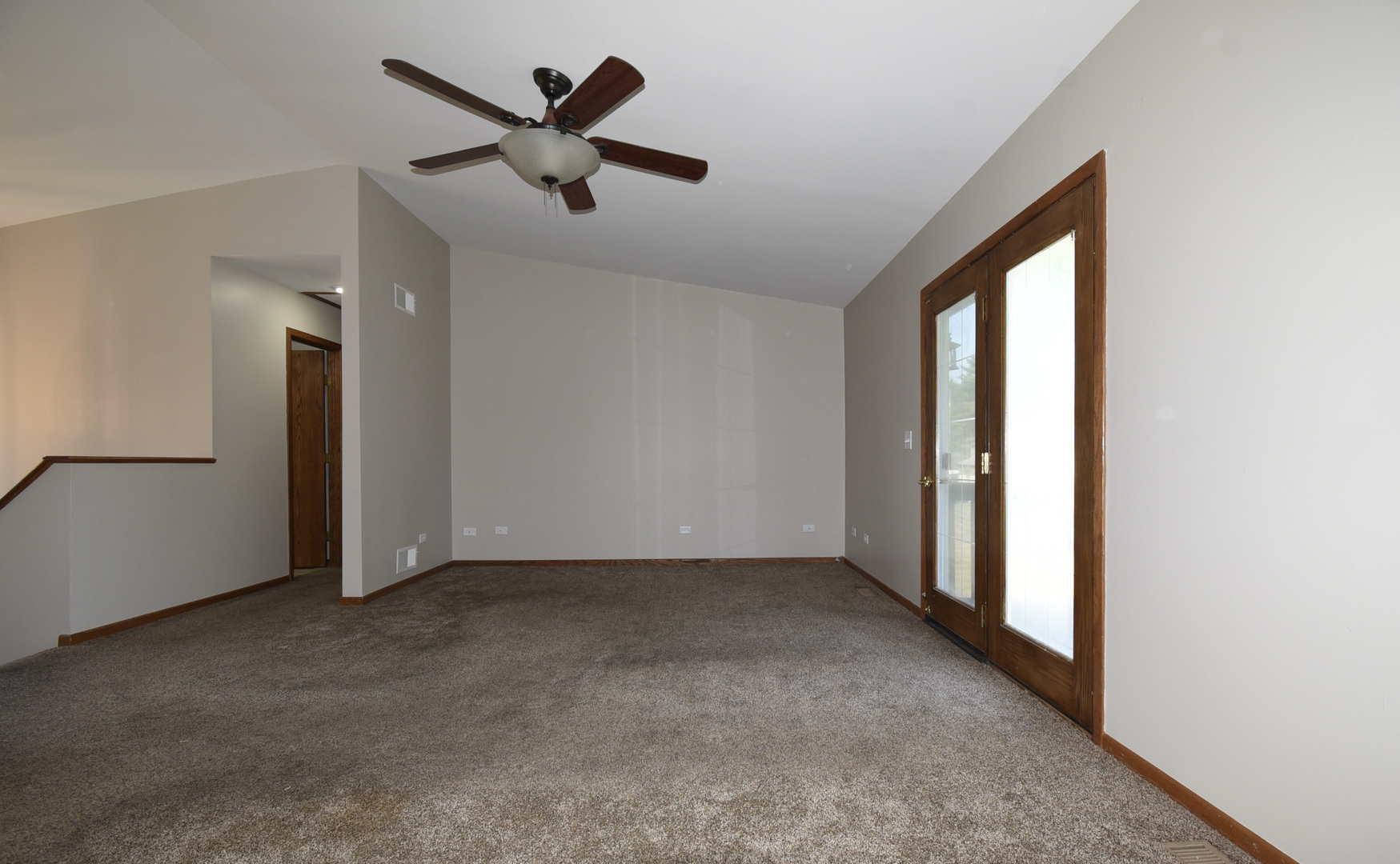 406 Garfield Road Fox Lake, IL 60041 - Photo 6 of 33 wooden floor in an empty room with a window