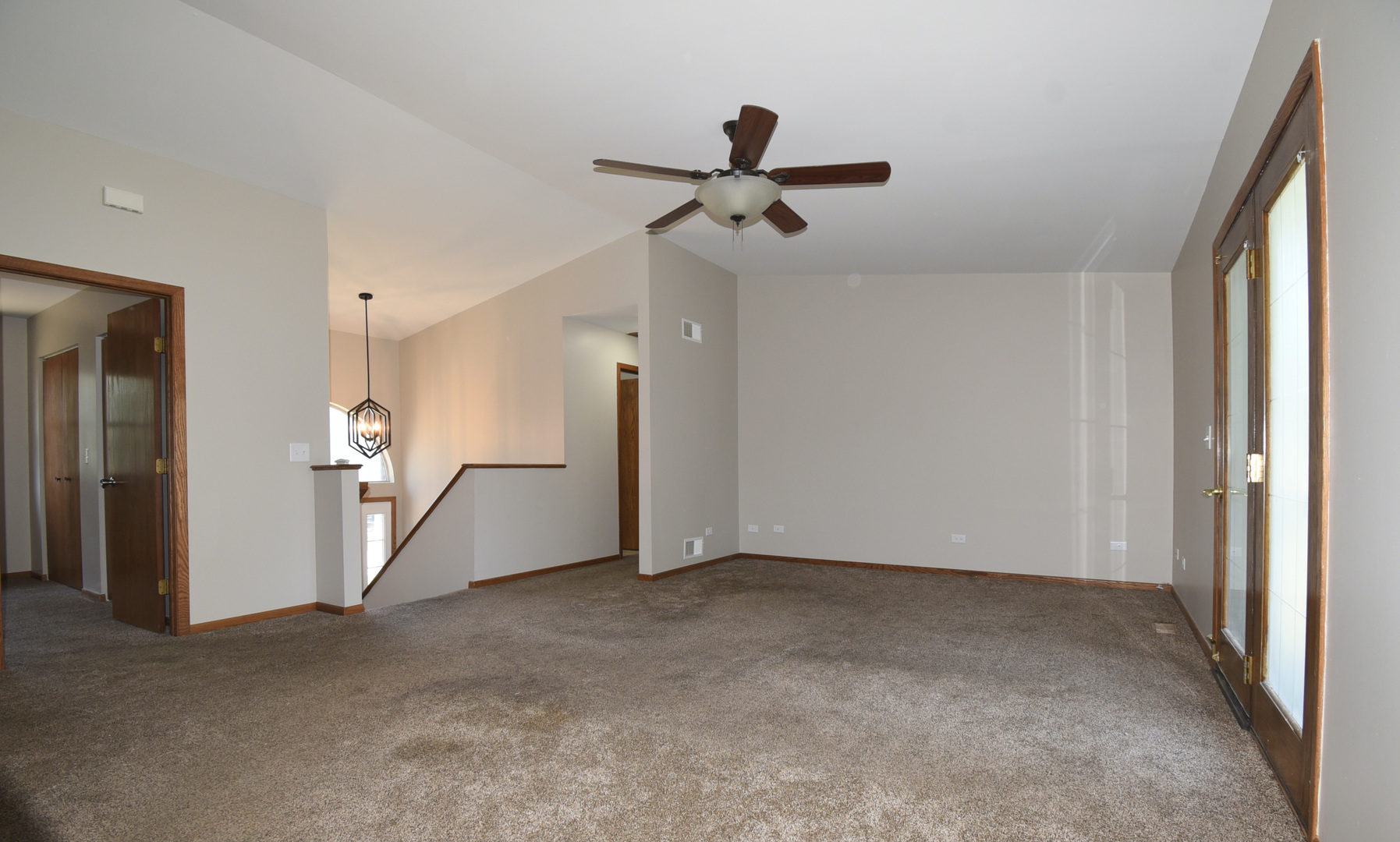 406 Garfield Road Fox Lake, IL 60041 - Photo 7 of 33 a view of empty room with ceiling fan