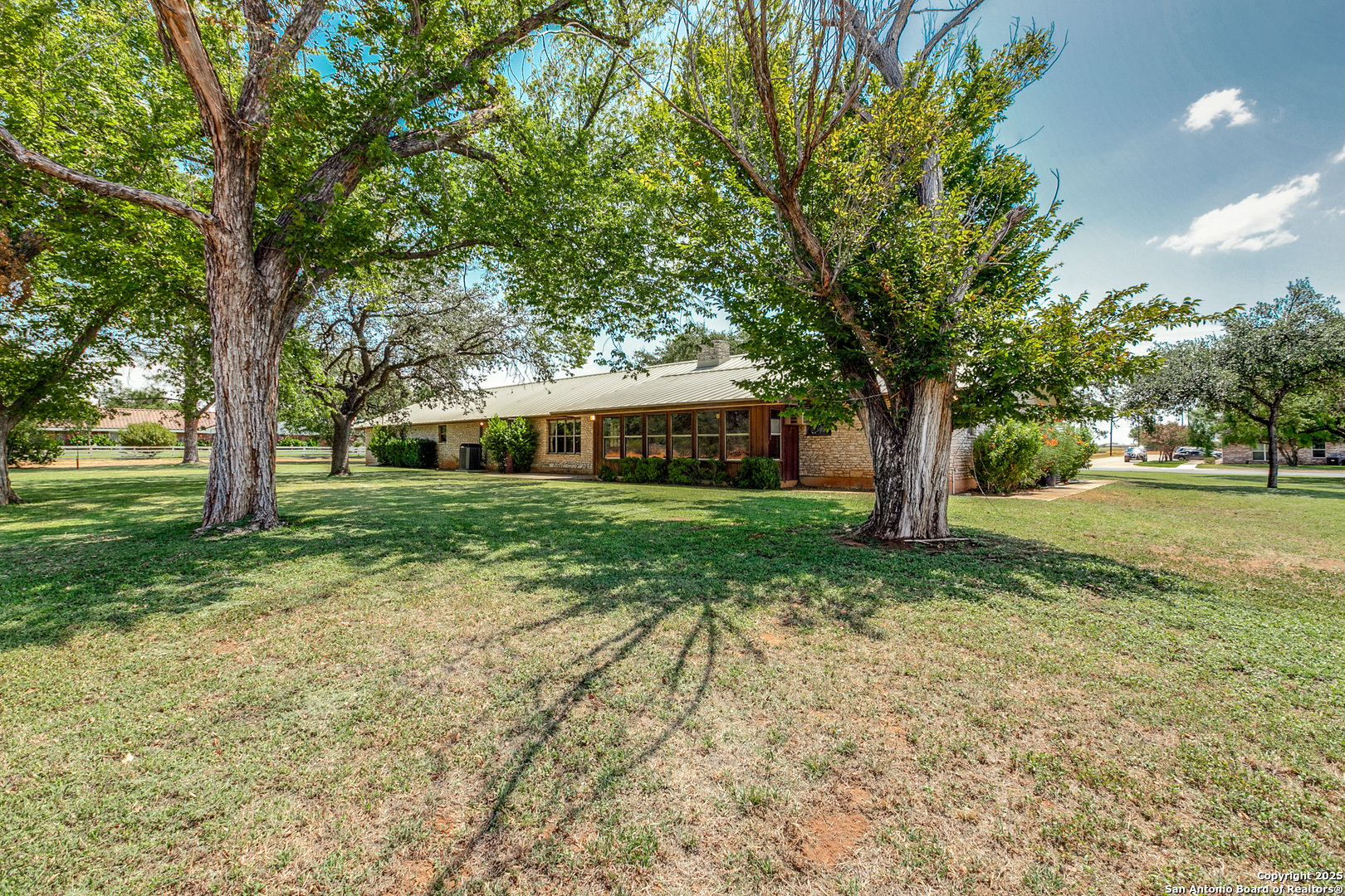 707 Berry Ranch Road Pearsall, TX 78061 - Photo 38 of 40 a front view of a house with yard and green space