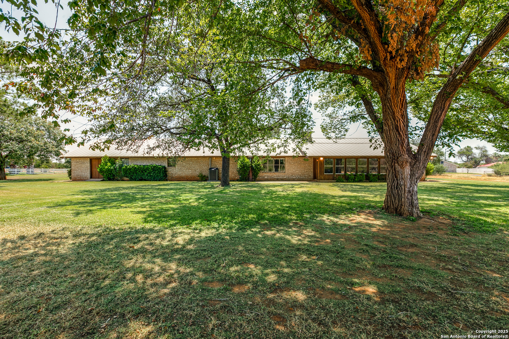 707 Berry Ranch Road Pearsall, TX 78061 - Photo 39 of 40 a front view of a house with garden