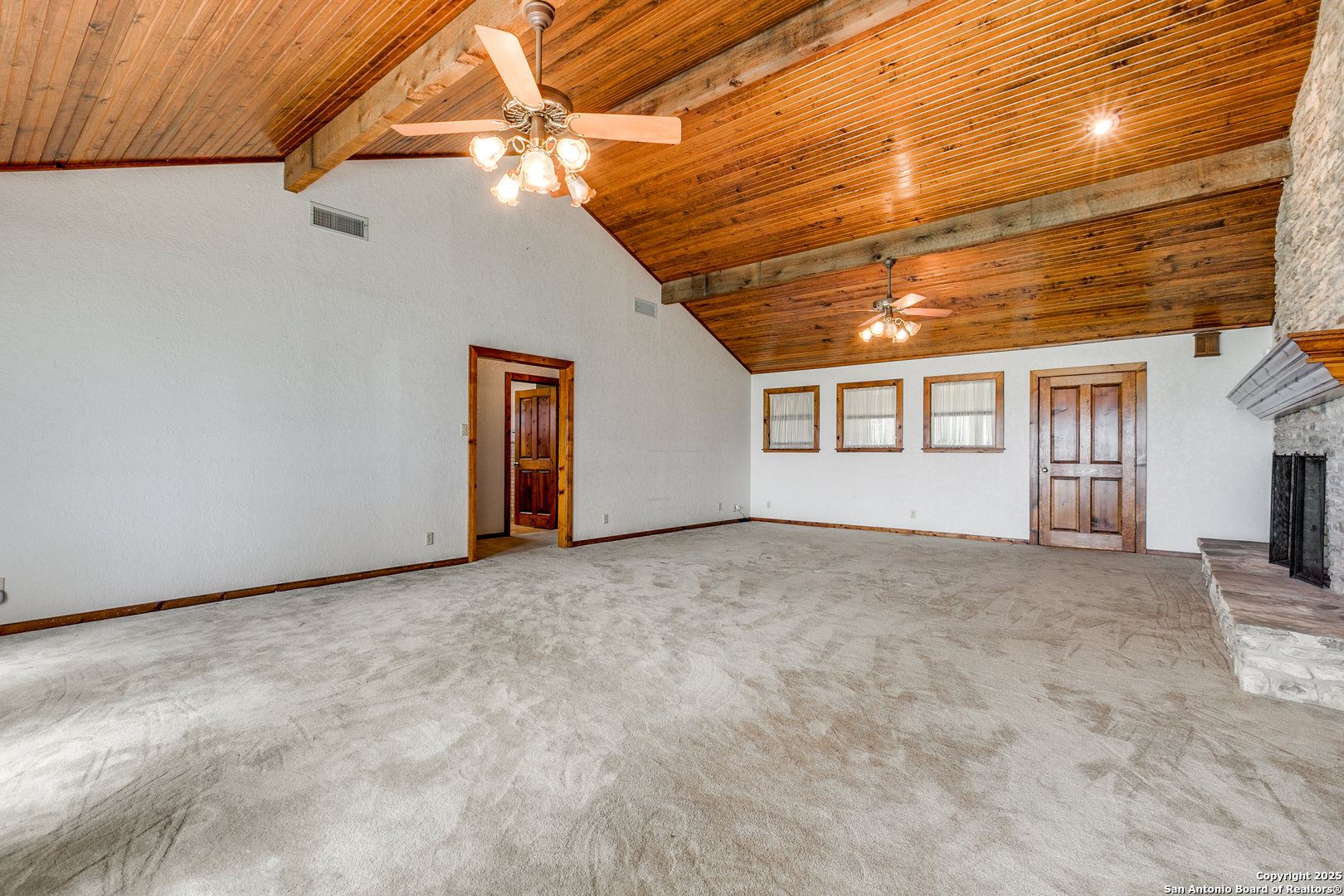 707 Berry Ranch Road Pearsall, TX 78061 - Photo 9 of 40 a view of an empty room with a window