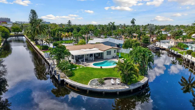 a view of a swimming pool with a patio