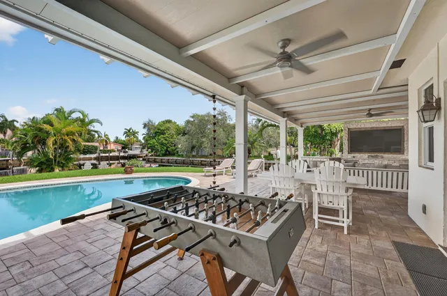 a view of a hallway with wooden shelves