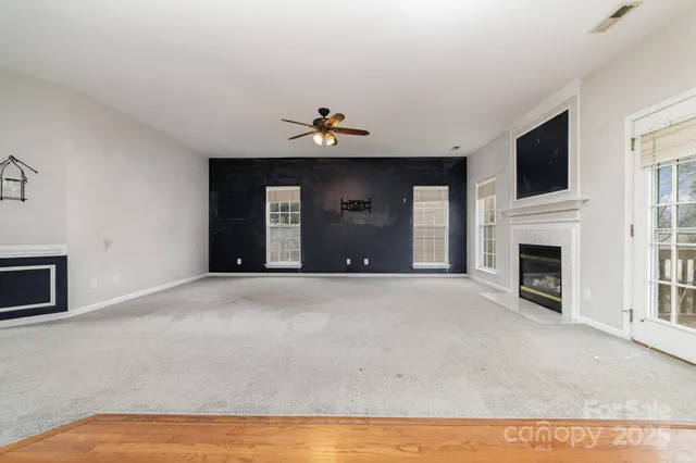 a view of a livingroom with a fireplace