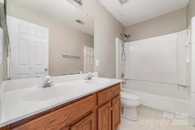 a view of balcony with wooden floor and fence