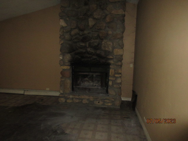 2115 Highwood Road McHenry, IL 60051 - Photo 13 of 31 a room with a fireplace