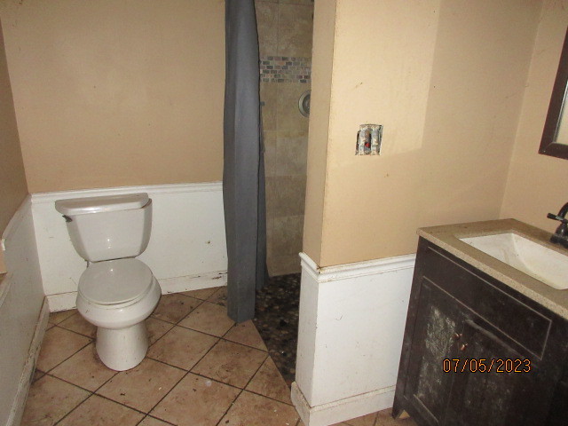 2115 Highwood Road McHenry, IL 60051 - Photo 16 of 31 a bathroom with a toilet and a sink