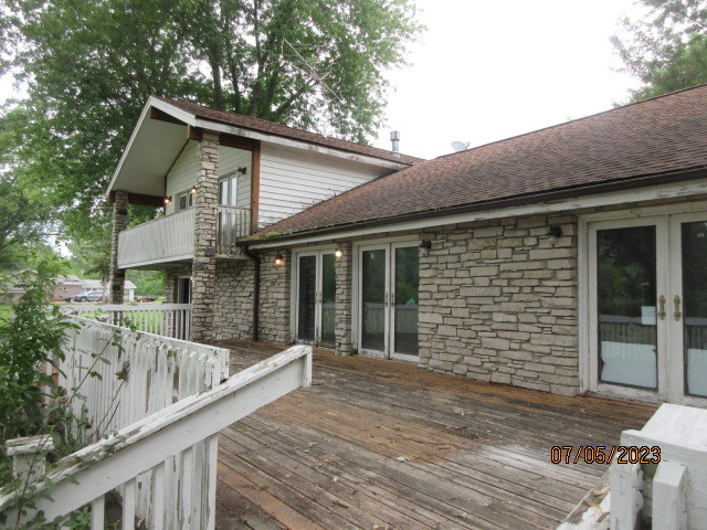 2115 Highwood Road McHenry, IL 60051 - Photo 23 of 31 a front view of a house with balcony