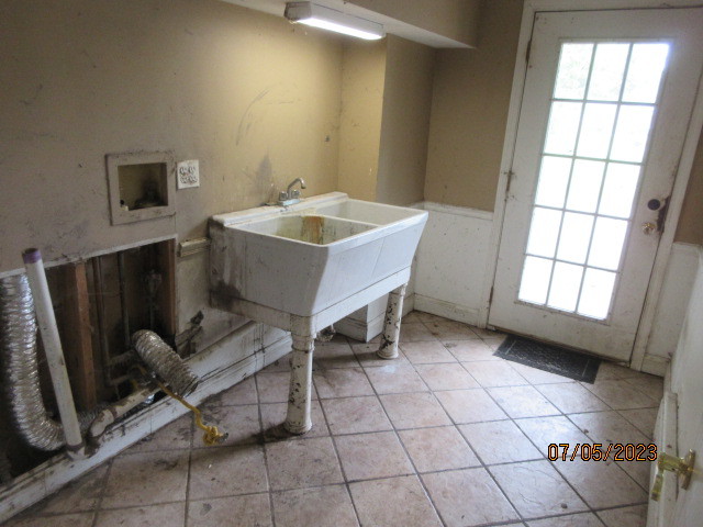 2115 Highwood Road McHenry, IL 60051 - Photo 7 of 31 a living room with a sink furniture and a window