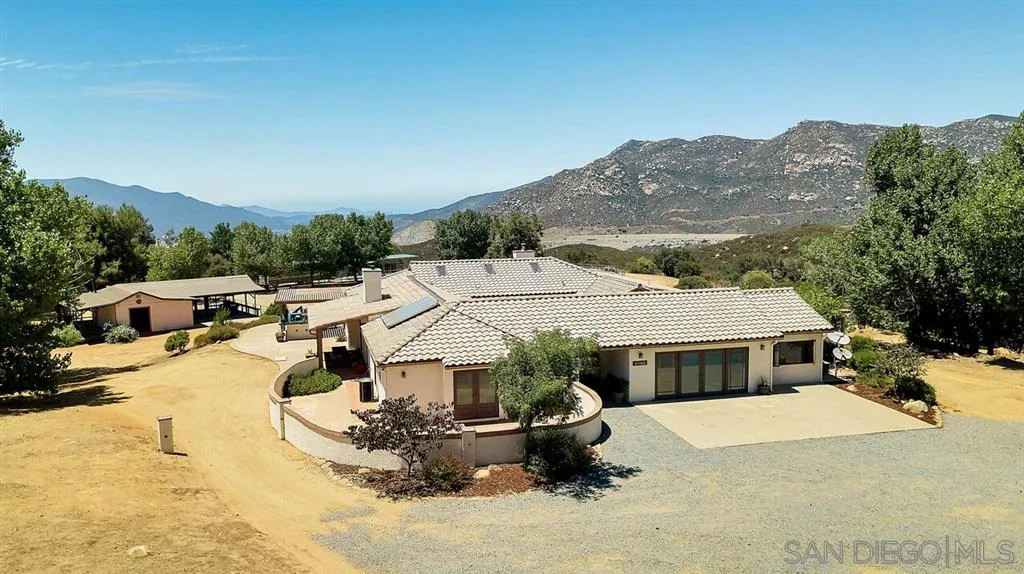 23250 Old Ranch Road Alpine, CA 91901 - Photo 1 of 25 a view of a house with a yard