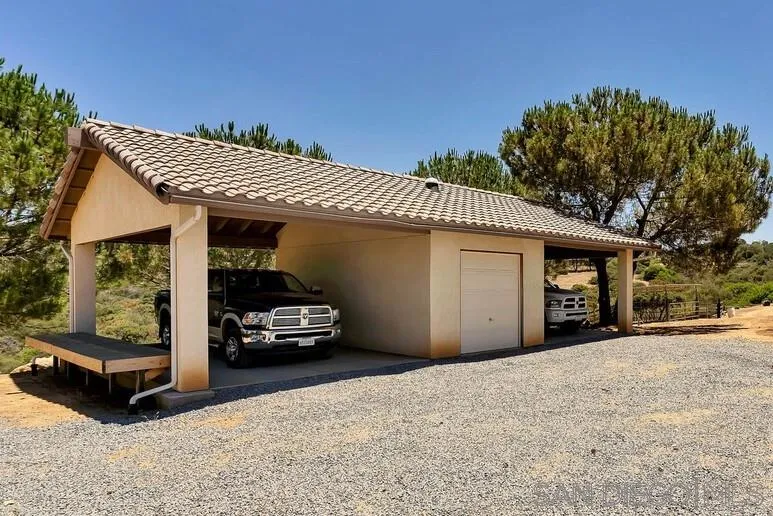 23250 Old Ranch Road Alpine, CA 91901 - Photo 18 of 25 a view of a car in front of a house