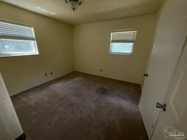 an empty room with a window