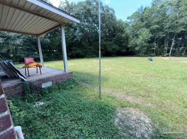 a view of a park with a slide