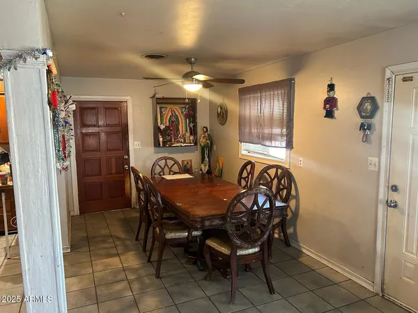 a view of a dining room with furniture