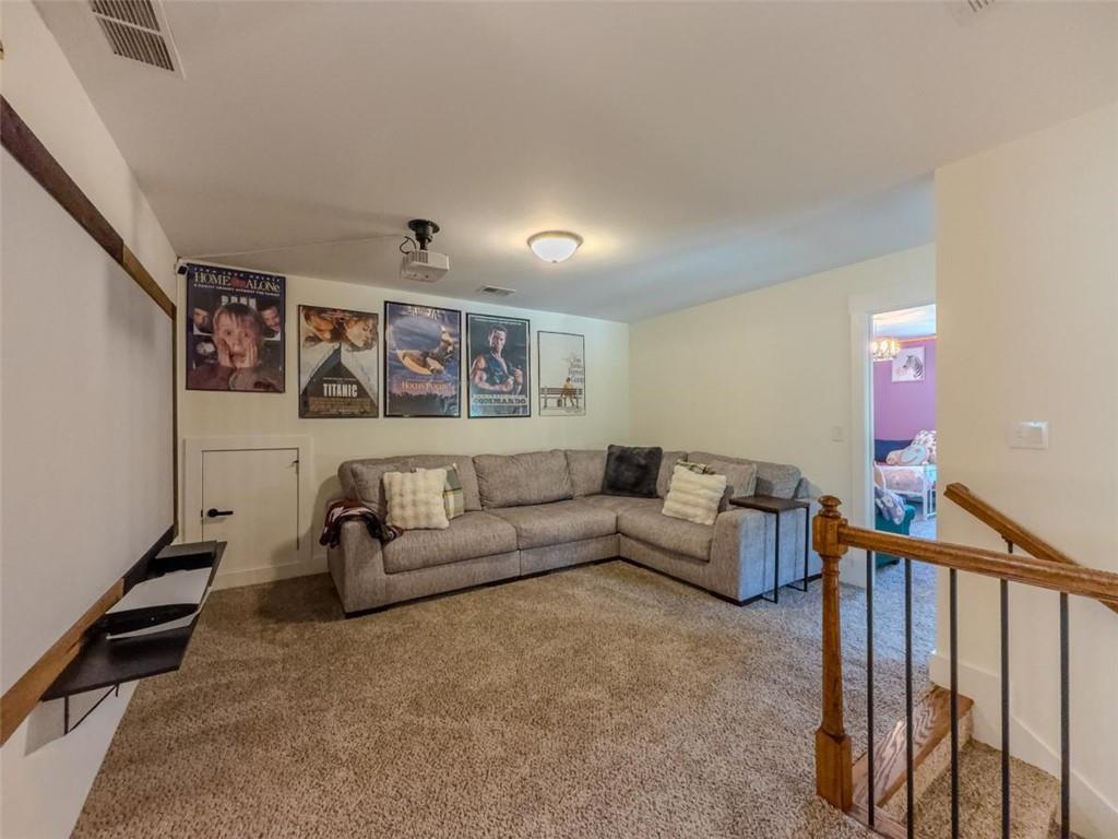 710 Poplar Street Monroe, GA 30655 - Photo 33 of 60 a living room with furniture and a window