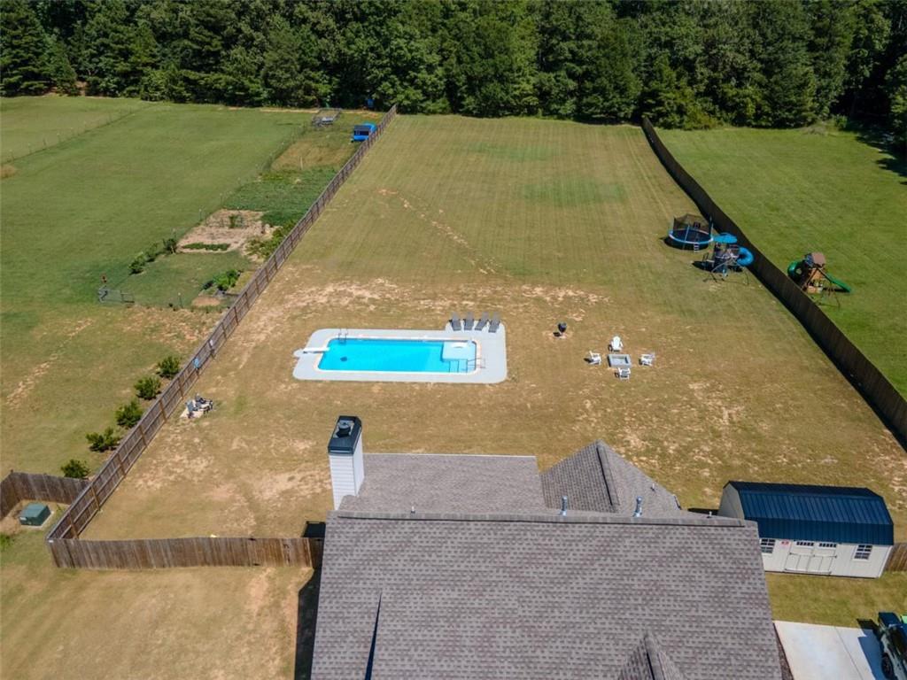 710 Poplar Street Monroe, GA 30655 - Photo 54 of 60 a view of a tennis court