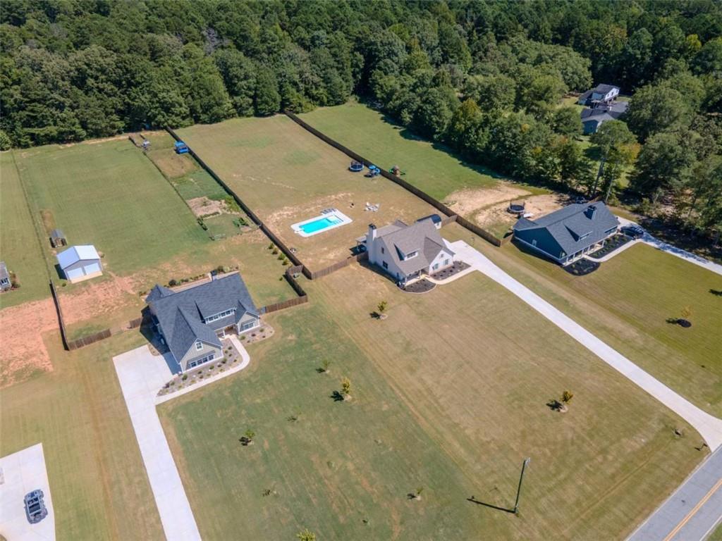 710 Poplar Street Monroe, GA 30655 - Photo 57 of 60 an aerial view of a house with a yard