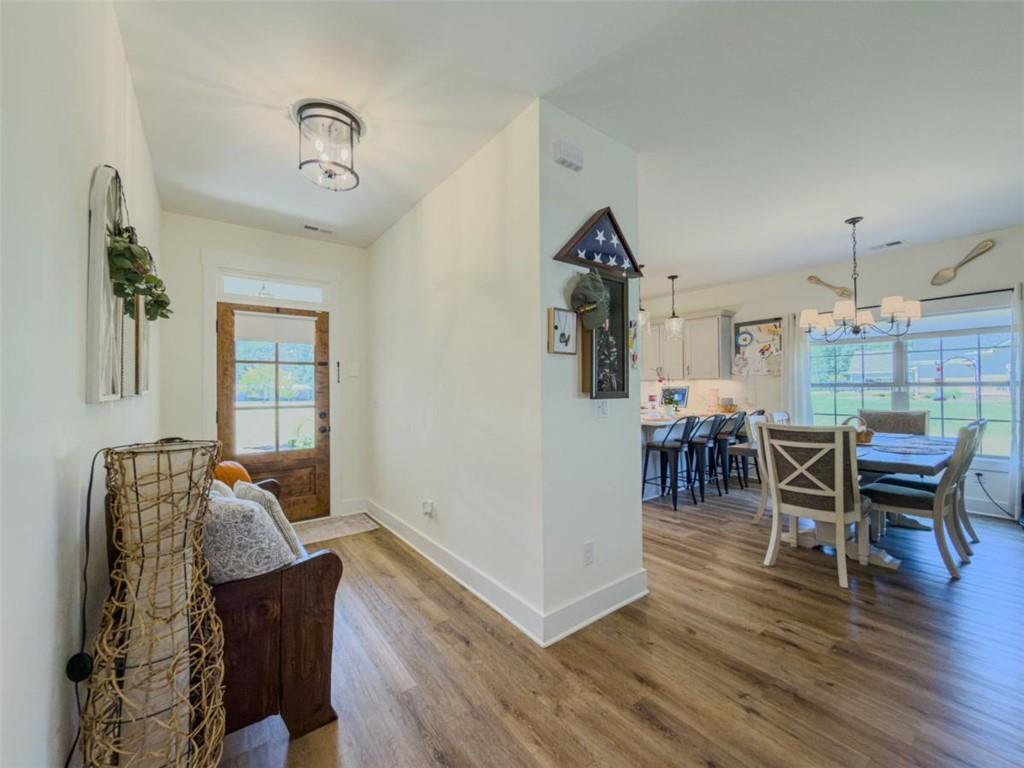 710 Poplar Street Monroe, GA 30655 - Photo 8 of 60 a living room with furniture and wooden floor