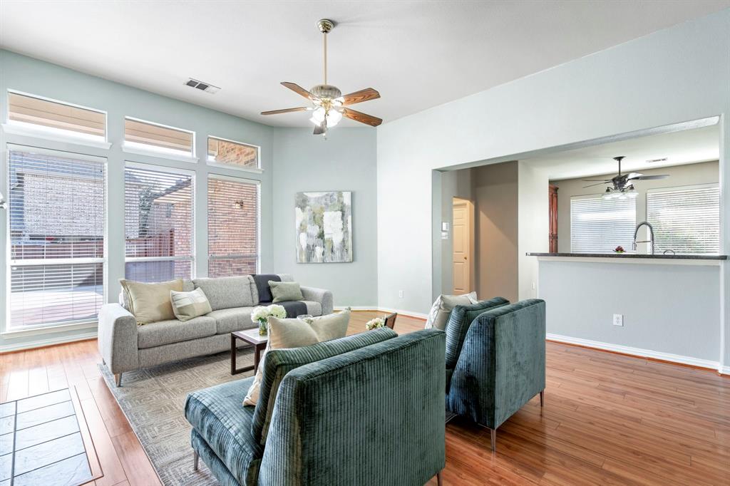 1105 Lamplight Way Allen, TX 75013 - Photo 14 of 40 a living room with furniture and a large window