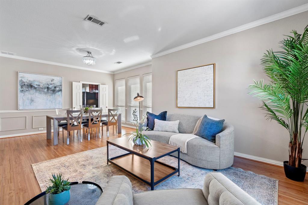 1105 Lamplight Way Allen, TX 75013 - Photo 6 of 40 a living room with furniture potted plant and a table