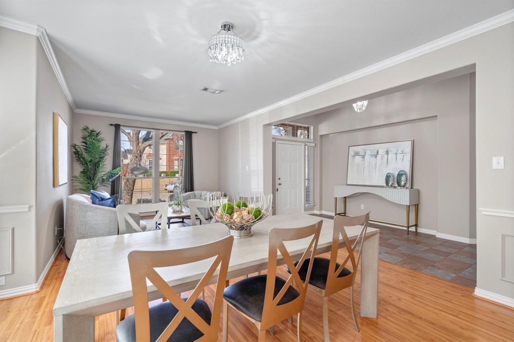 1105 Lamplight Way Allen, TX 75013 - Photo 8 of 40 a view of a dining room with furniture window and wooden floor