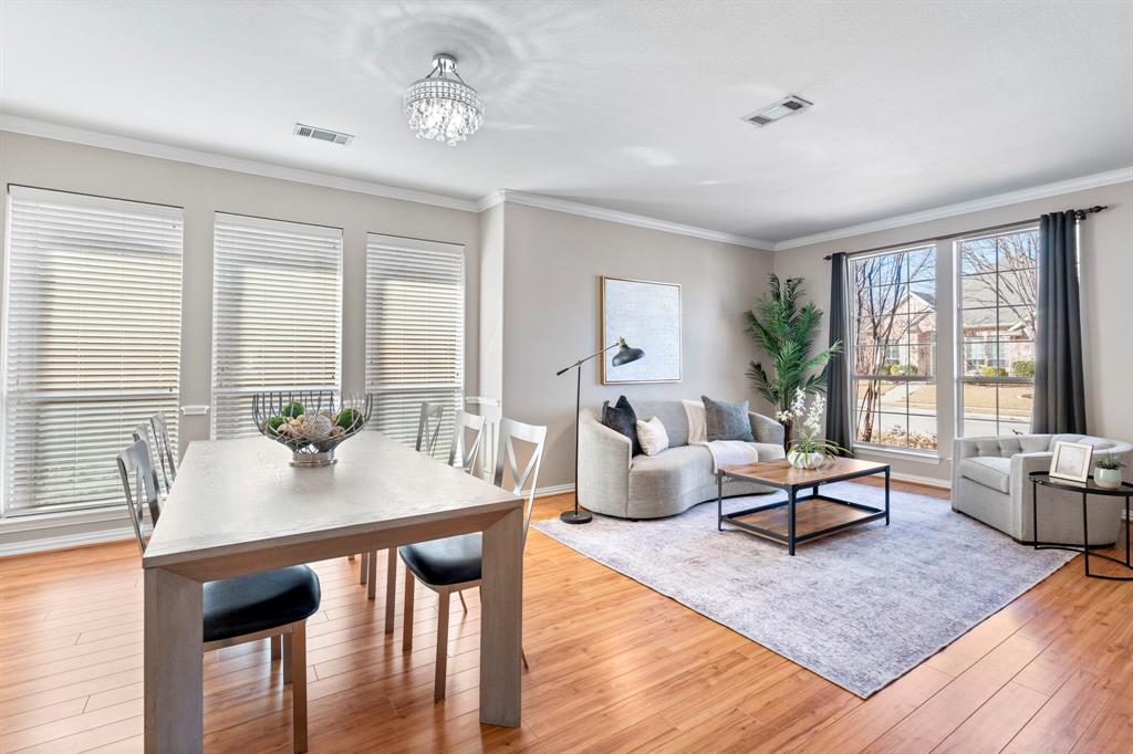 1105 Lamplight Way Allen, TX 75013 - Photo 10 of 40 a living room with furniture and wooden floor