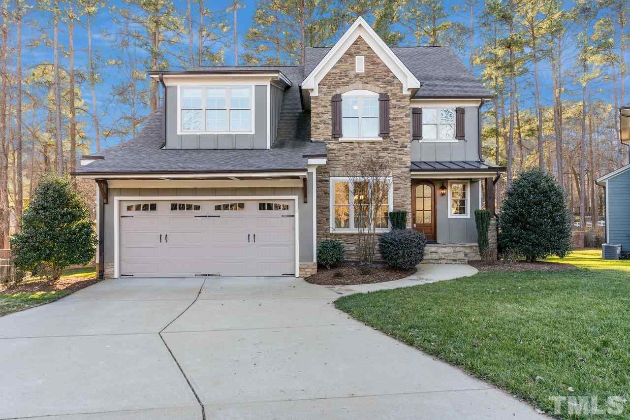 8505 Wynhurst Court Raleigh, NC 27613 - Photo 1 of 30 a front view of a house with garden