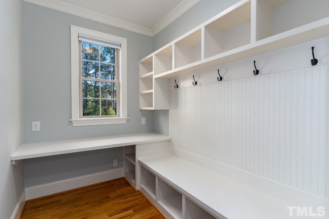 8505 Wynhurst Court Raleigh, NC 27613 - Photo 17 of 30 a view of walk in closet with window