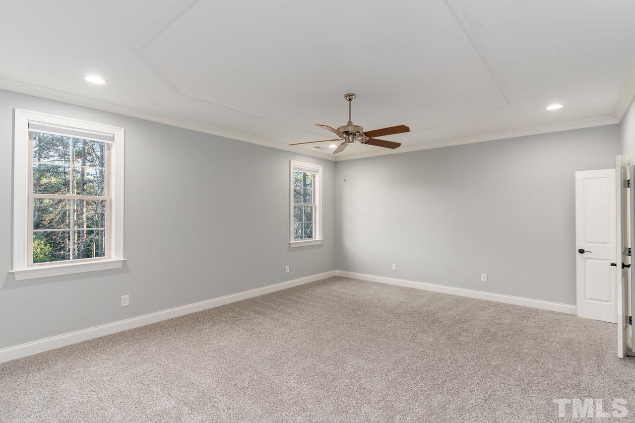 8505 Wynhurst Court Raleigh, NC 27613 - Photo 22 of 30 a view of an empty room with a window