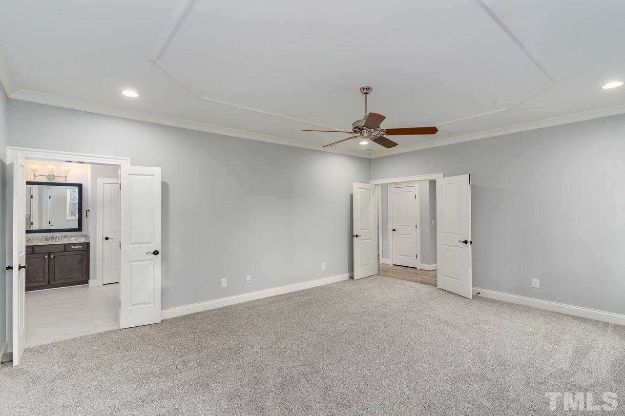 8505 Wynhurst Court Raleigh, NC 27613 - Photo 23 of 30 a view of a livingroom with a ceiling fan and window
