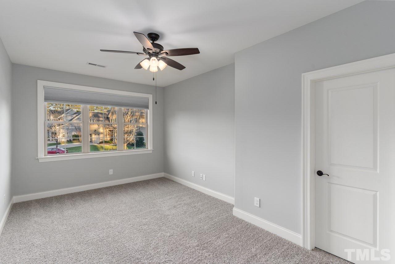 8505 Wynhurst Court Raleigh, NC 27613 - Photo 27 of 30 an empty room with windows and fan