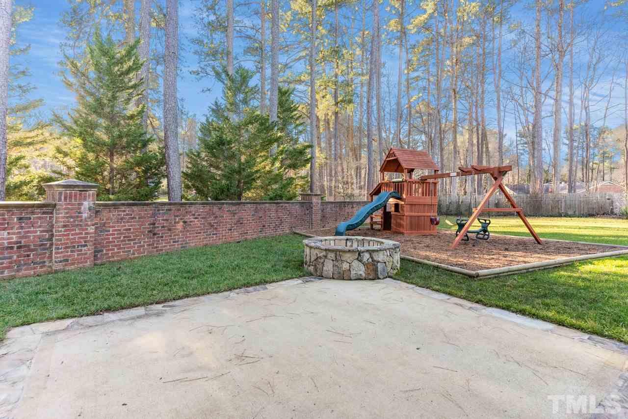 8505 Wynhurst Court Raleigh, NC 27613 - Photo 30 of 30 a view of a park with a slide