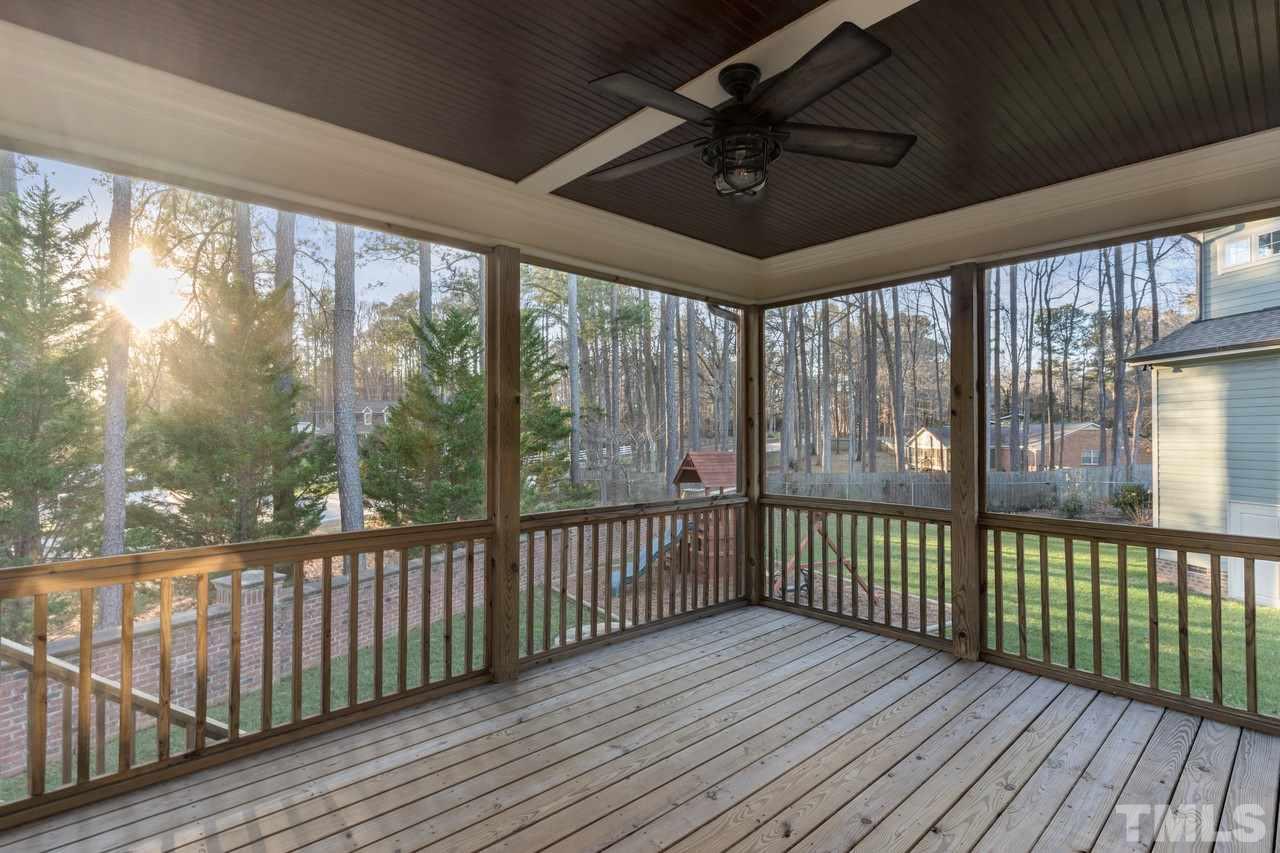 8505 Wynhurst Court Raleigh, NC 27613 - Photo 4 of 30 a view of a porch with wooden floor
