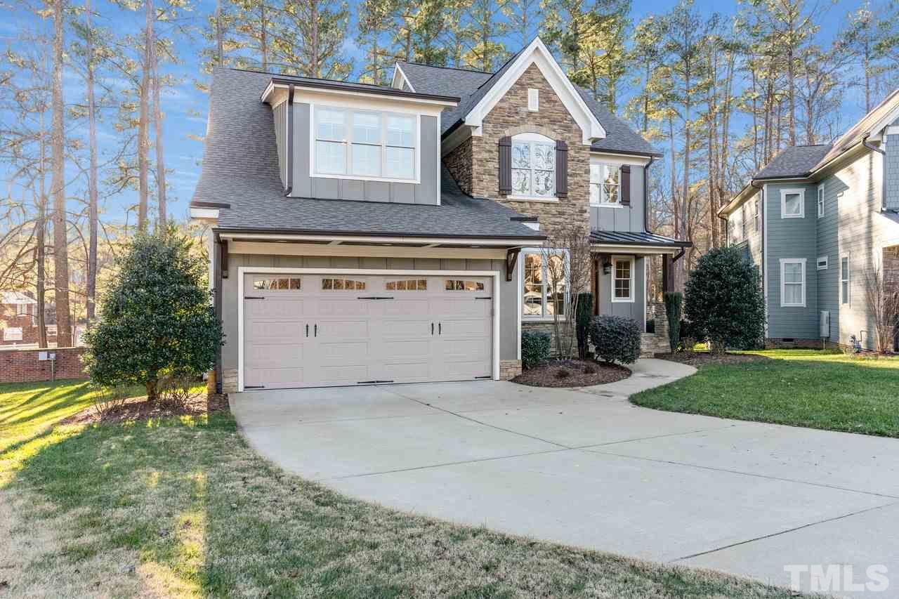 8505 Wynhurst Court Raleigh, NC 27613 - Photo 6 of 30 a view of a house with a yard