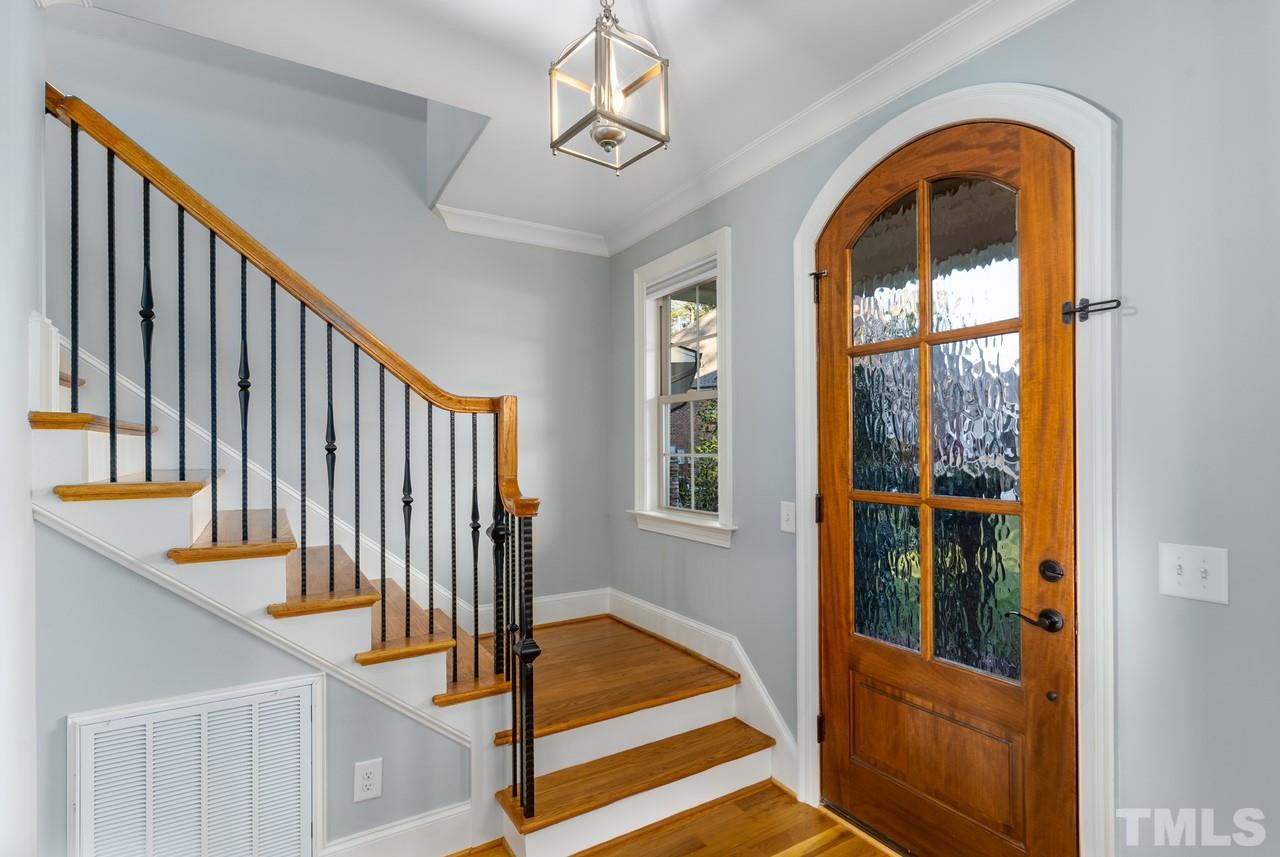 8505 Wynhurst Court Raleigh, NC 27613 - Photo 9 of 30 a view of entryway with a front door